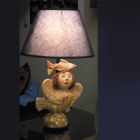 Лампа с подставкой в виде сирин
